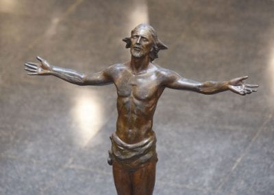 Christ Rising, Bronze,1978, Atrium of the Lila D. Bunch Library .